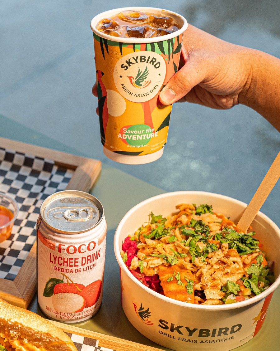 Fresh salmon poke bowl with avocado and crispy vegetables in Montreal restaurant